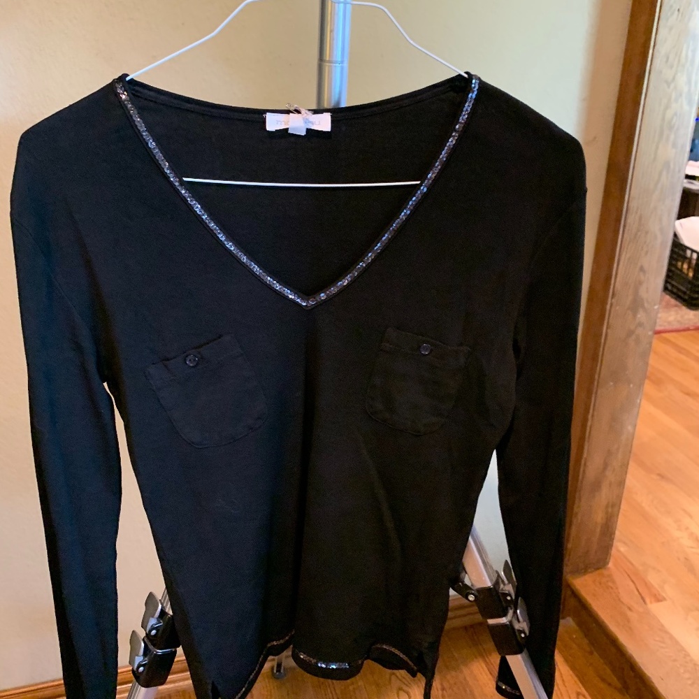 Mo& Su   Long sleeve Black top with trim at the ne